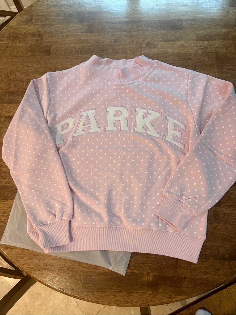 PARKE Polka Dot Varsity Mockneck
Color: Sprinkle Polka Dots